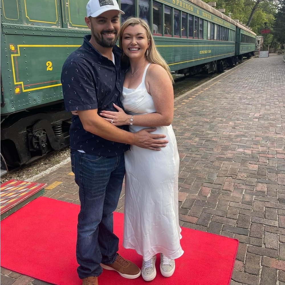 Lulu’s long white silk dress with cowl neck and tie back